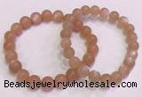 CGB4587 7.5 inches 8mm - 9mm round sunstone beaded bracelets