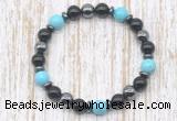 CGB8379 8mm blue howlite, black onyx & hematite energy bracelet