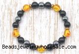 CGB8411 8mm synthetic amber, black onyx & hematite energy bracelet