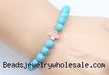 CGB9352 8mm, 10mm blue howlite & cross hematite power beads bracelets