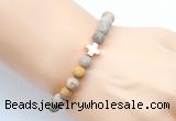 CGB9434 8mm, 10mm matte fossil coral & cross hematite power beads bracelets