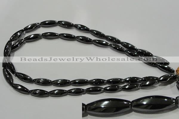 CHE168 15.5 inches 7*20mm faceted & twisted rice hematite beads