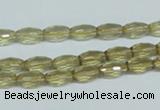 CLQ10 15.5 inches 6*10mm faceted rice natural lemon quartz beads