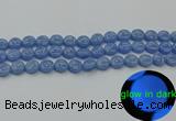 CLU131 15.5 inches 10mm flat round blue luminous stone beads