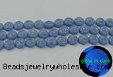 CLU132 15.5 inches 12mm flat round blue luminous stone beads