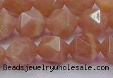 CMS1134 15.5 inches 12mm faceted nuggets peach moonstone beads