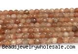 CMS2258 15 inches 6mm faceted round orange moonstone beads