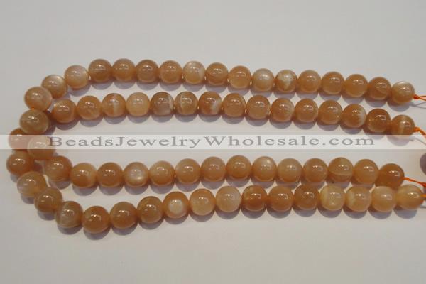 CMS704 15.5 inches 12mm round peach moonstone beads wholesale