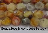 CNG6222 15.5 inches 6mm faceted nuggets yellow crazy lace agate beads