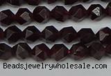 CNG7275 15.5 inches 6mm faceted nuggets red garnet beads