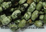 CRH66 15.5 inches 7*11mm faceted rice rhyolite beads wholesale