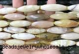 CRI143 15.5 inches 10*30mm faceted rice yellow opal gemstone beads