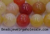 CRO1164 15.5 inches 12mm round golden silk jade beads wholesale