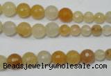 CRO726 15.5 inches 6mm – 14mm faceted round yellow jade beads