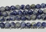 CRO771 15.5 inches 6mm faceted round blue spot stone beads wholesale