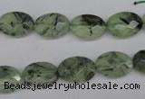 CRU188 15.5 inches 10*14mm faceted oval green rutilated quartz beads