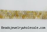 CRU667 15.5 inches 6mm faceted round golden rutilated quartz beads