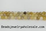 CRU668 15.5 inches 8mm faceted round golden rutilated quartz beads