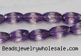 CSA25 15.5 inches 7*12mm faceted rice synthetic amethyst beads