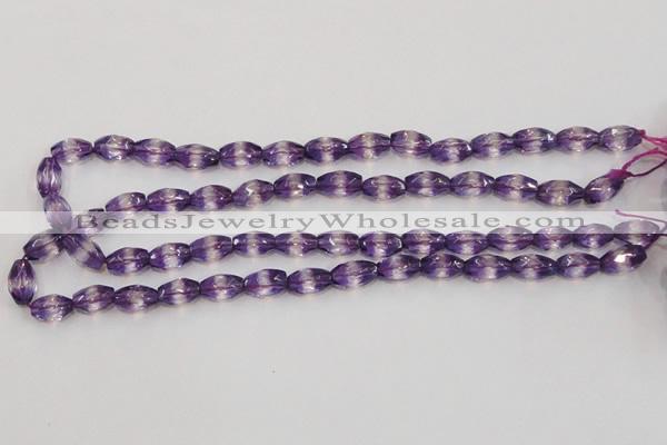 CSA25 15.5 inches 7*12mm faceted rice synthetic amethyst beads