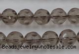 CSQ253 15.5 inches 12mm carved round matte smoky quartz beads