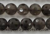 CSQ254 15.5 inches 14mm carved round matte smoky quartz beads