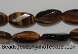 CTE1098 15.5 inches 10*20mm twisted & faceted oval yellow tiger eye beads