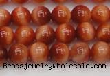 CTE1661 15.5 inches 6mm round sun orange tiger eye beads