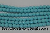 CTU1220 15.5 inches 4mm faceted round synthetic turquoise beads