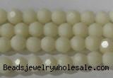 CTU1440 15.5 inches 4mm faceted round synthetic turquoise beads