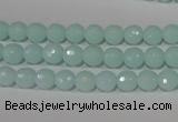 CTU2572 15.5 inches 6mm faceted round synthetic turquoise beads