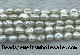 FWP351 15 inches 8mm - 9mm baroque white freshwater pearl strands