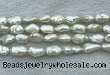 FWP353 15 inches 9mm - 10mm baroque white freshwater pearl strands